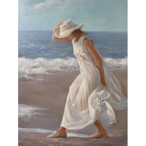 26 - A MODERN FRAMED OIL ON CANVAS DEPICTING A LADY ON THE BEACH - SIGNED