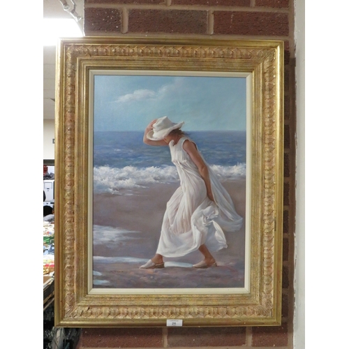 26 - A MODERN FRAMED OIL ON CANVAS DEPICTING A LADY ON THE BEACH - SIGNED