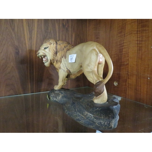 237 - A BESWICK MATT LION