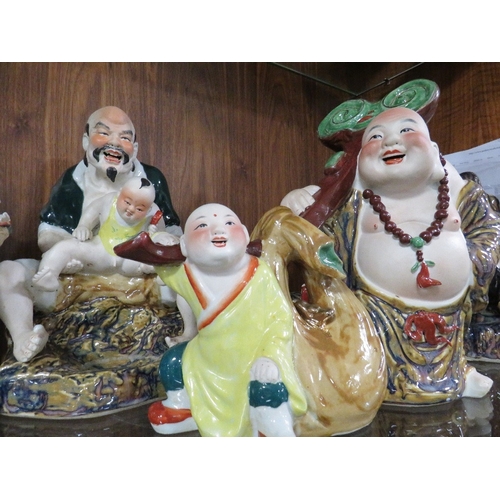 238 - A COLLECTION OF FIVE ASSORTED LARGE ORIENTAL PORCELAIN FIGURES, each dressed in traditional dress, i... 