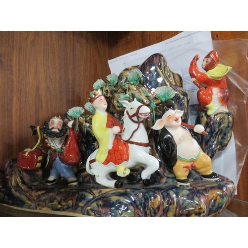 238 - A COLLECTION OF FIVE ASSORTED LARGE ORIENTAL PORCELAIN FIGURES, each dressed in traditional dress, i... 