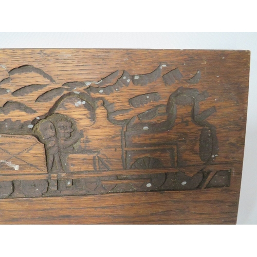 246 - A VINTAGE CARVED WOOD PANEL DEPICTING A STEAM ENGINE AND CARRIAGES EMERGING FROM A TUNNEL