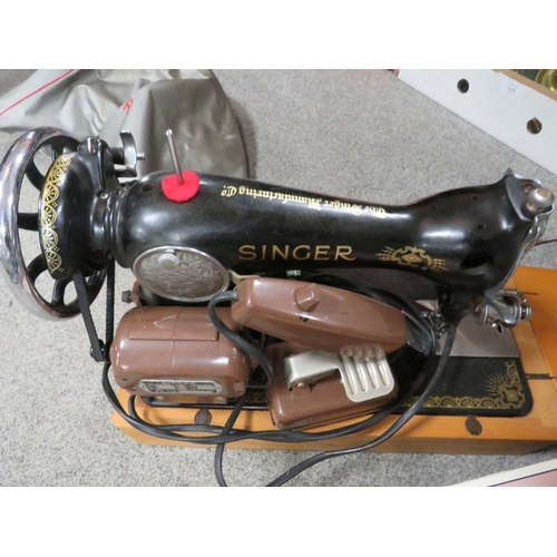 126 - A SINGER SEWING MACHINE WITH A DOUBLE DECKER SANDER