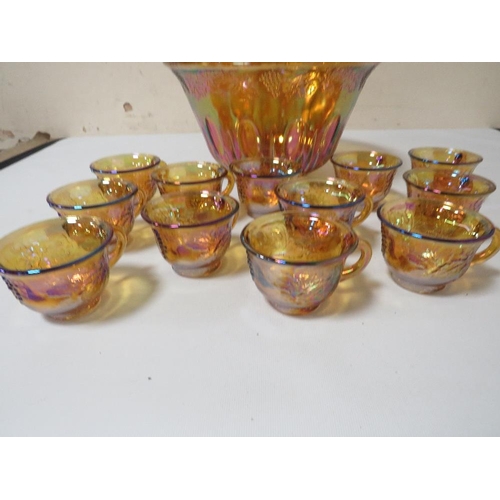 247 - A VINTAGE IRIDESCENT PUNCH BOWL AND GLASSES SET