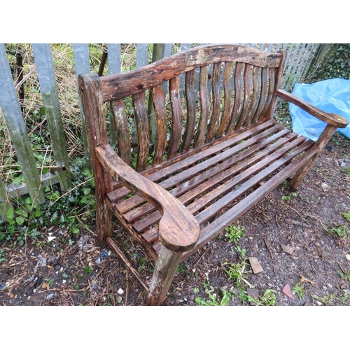 601 - A SOLID HARDWOOD ARCH BACK GARDEN BENCH