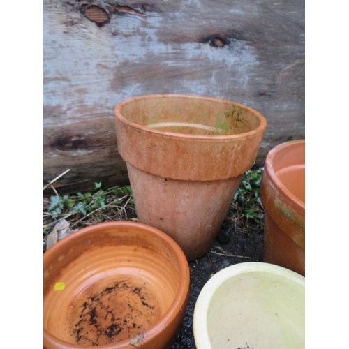 603 - A SELECTION OF ELEVEN TERRACOTTA PLANTERS TO INCLUDE CERAMIC EXAMPLES