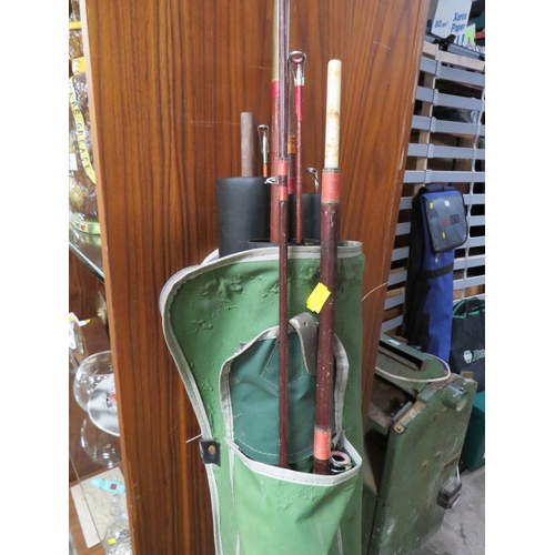 612 - A SELECTION OF FISHING EQUIPMENT TO INCLUDE RODS AND NETS