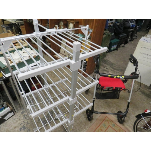 618 - A FOLD AWAY CLOTHES AIRER AND A FOUR WHEEL WALKER