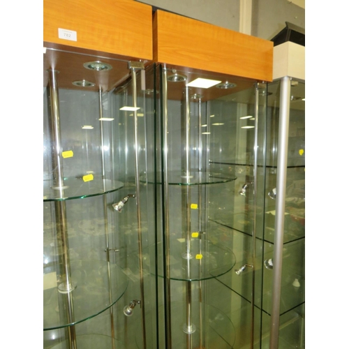 702 - A PAIR OF MODERN SQUARE LIGHT-UP REVOLVING DISPLAY CABINETS