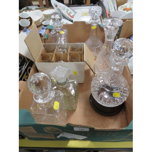 145 - A QUANTITY OF CUT GLASS DECANTERS ETC