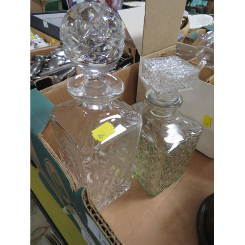 145 - A QUANTITY OF CUT GLASS DECANTERS ETC