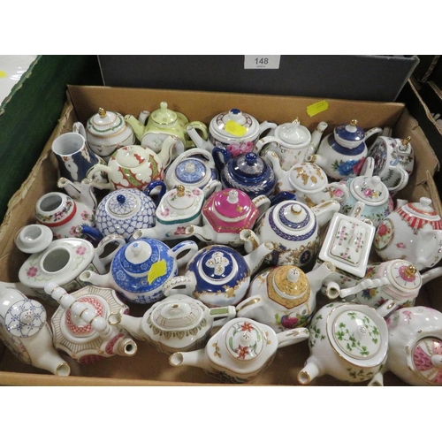 147 - SMALL TRAY OF NOVELTY COLLECTABLE MINIATURE TEA POTS