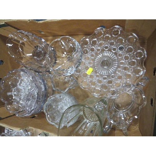 200 - FOUR TRAYS OF CLEAR PRESSED GLASS