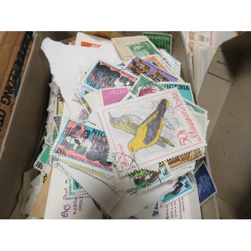 416 - A BOX OF STAMPS AND ALBUMS WITH LOOSE STAMPS