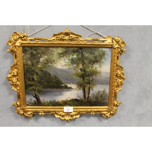 42 - A SMALL GILT FRAMED OIL ON BOARD OF A LAKELAND SCENE