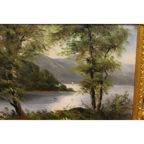 42 - A SMALL GILT FRAMED OIL ON BOARD OF A LAKELAND SCENE