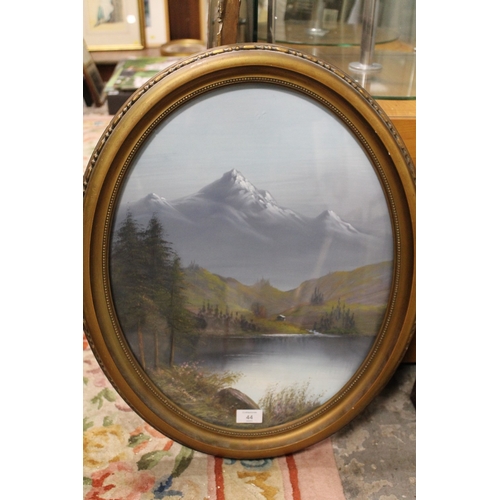 44 - L. CROZIER - AN OVAL OIL OF AN ALPINE SCENE