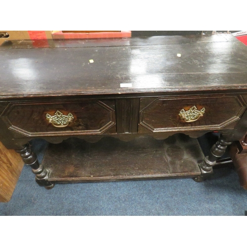 765 - A VINTAGE OAK TWO DRAWER DRESSER W-115 CM