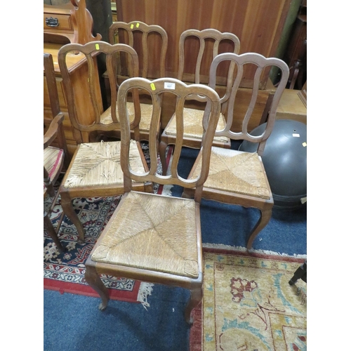 807 - A SET OF FIVE FRENCH STYLE OAK WICKERSEAT CHAIRS