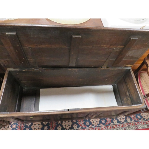 811 - AN OAK TRIPLE PANEL COFFER W 150 CM