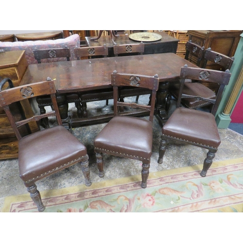 820 - A VINTAGE OAK REFECTORY TABLE WITH EIGHT OAK GOTHIC STYLE CHAIRS