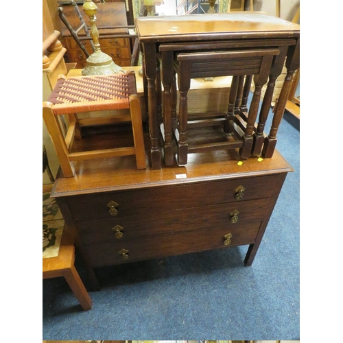 845 - A VINTAGE OAK THREE DRAWER CHEST NEST OF TABLES AND A STOOL