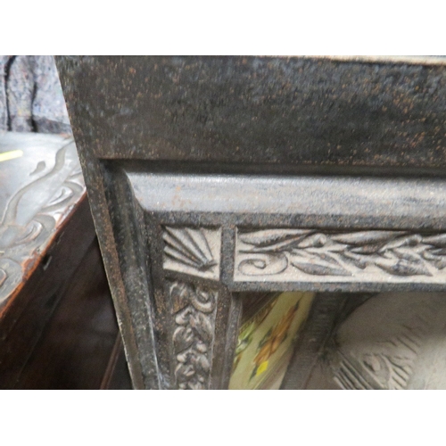 706 - A VINTAGE CAST IRON FIRE SURROUND WITH INSET TILES A/F