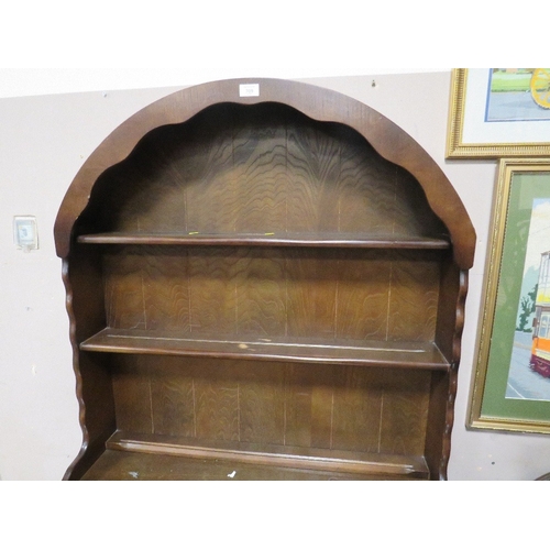 709 - AN OAK ARCHED DRESSER