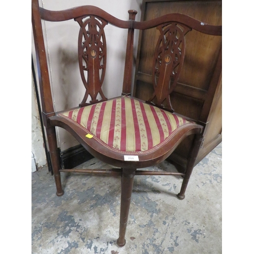 711 - AN EDWARDIAN MAHOGANY INLAID CORNER CHAIR