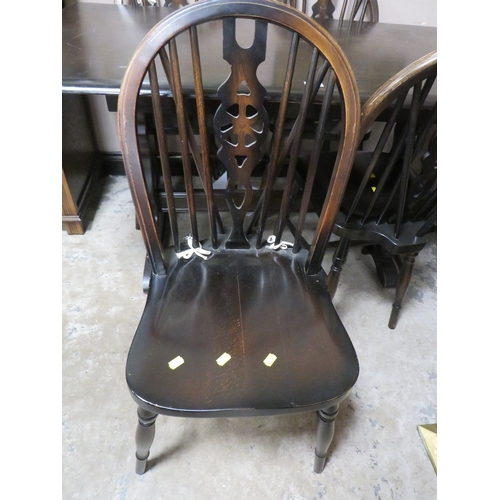 712 - AN OAK REFECTORY TABLE AND FOUR CHAIRS