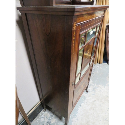 717 - AN EDWARDIAN ROSEWOOD AN INLAID MUSIC CABINET