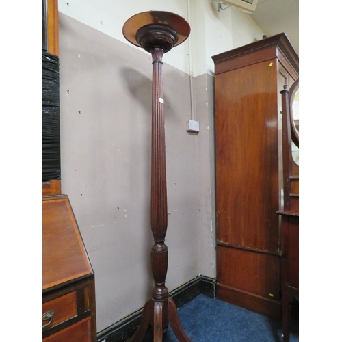 733 - A FLUTED MAHOGANY TORCHERE WITH CARVED DETAIL AND COPPER TOP H 187 CM