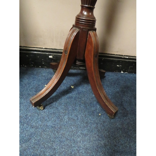 733 - A FLUTED MAHOGANY TORCHERE WITH CARVED DETAIL AND COPPER TOP H 187 CM