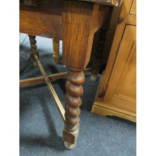 853 - A VINTAGE OAK BARLEYTWIST DRAWLEAF TABLE