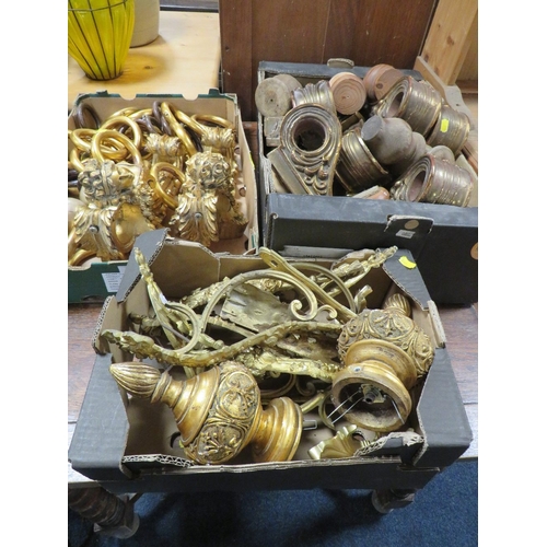 854 - THREE BOXES OF ASSORTED CURTAIN GILT FITTINGS AND A BRASS FENDER