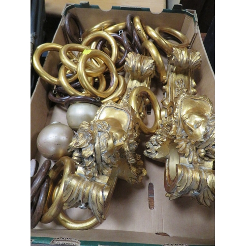 854 - THREE BOXES OF ASSORTED CURTAIN GILT FITTINGS AND A BRASS FENDER