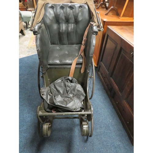 855 - A VINTAGE CHILDS PUSHCHAIR