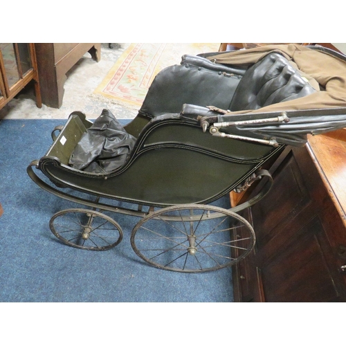 855 - A VINTAGE CHILDS PUSHCHAIR