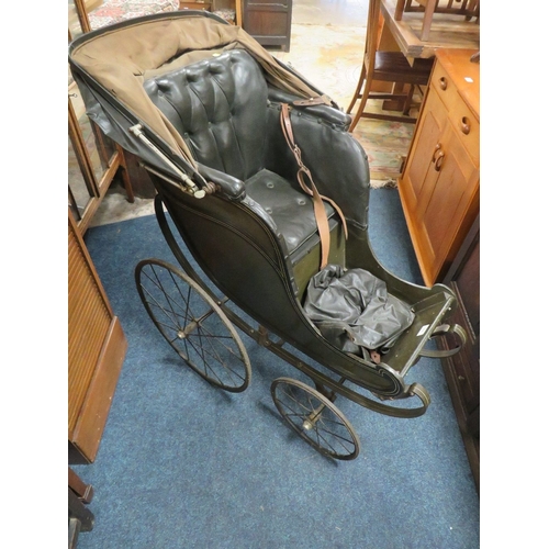 855 - A VINTAGE CHILDS PUSHCHAIR