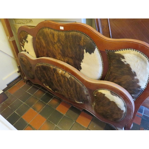 863 - AN UNUSUAL ANIMAL HIDE DOUBLE BED FRAME WITH STRETCHERS