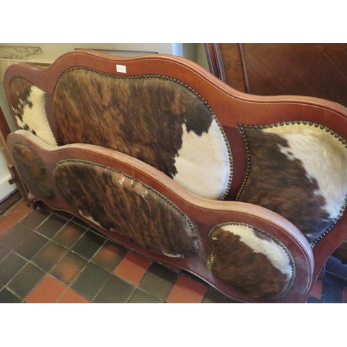 863 - AN UNUSUAL ANIMAL HIDE DOUBLE BED FRAME WITH STRETCHERS