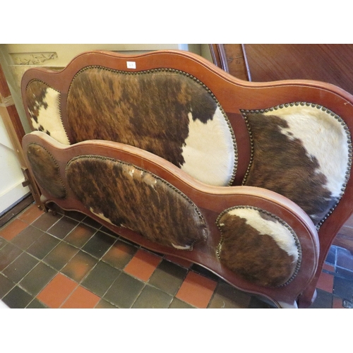 863 - AN UNUSUAL ANIMAL HIDE DOUBLE BED FRAME WITH STRETCHERS