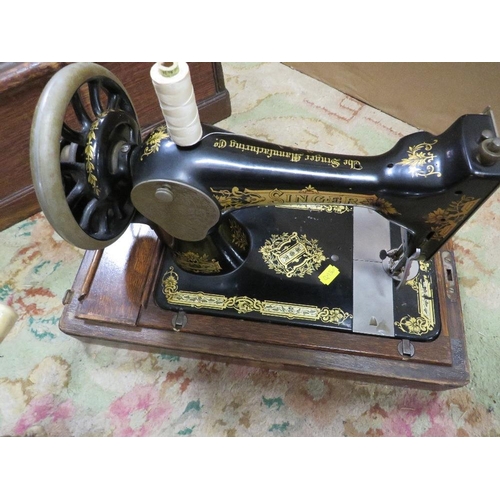 128 - A VINTAGE CASED SINGER SEWING MACHINE SERIAL NO D982240