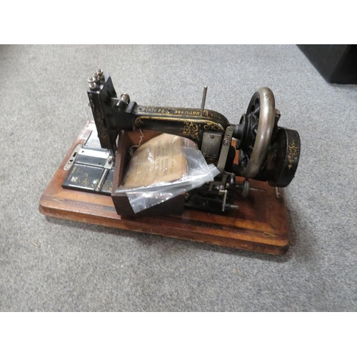 157 - A VINTAGE CASED FRISTER & ROSSMANN'S GERMAN SEWING MACHINE PLUS ACCESSORIES