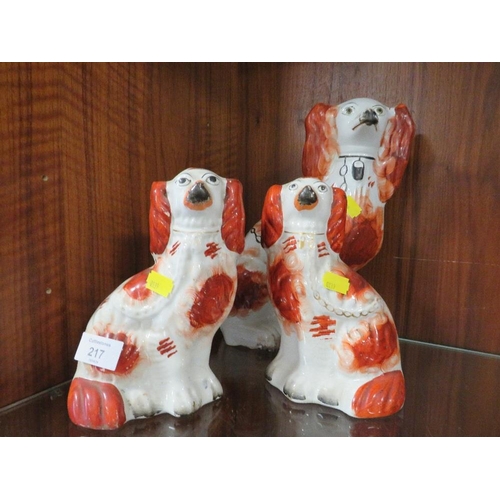 217 - THREE STAFFORDSHIRE STYLE  SPANIELS