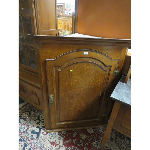 787 - AN ANTIQUE LARGE OAK HANGING CORNER CUPBOARD