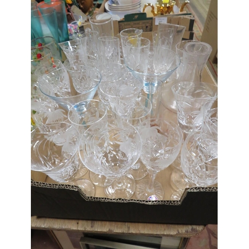 87 - TWO TRAYS OF GLASSWARE TO INCLUDE ETCHED EXAMPLES