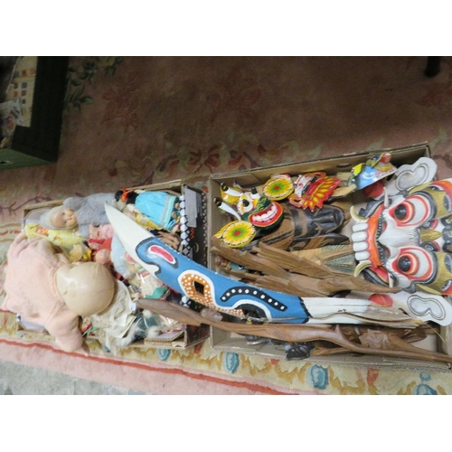 88 - A TRAY OF TREEN TO INCLUDE MASKS TOGETHER WITH A TRAY OF ASSORTED DOLLS