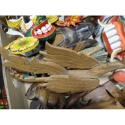 88 - A TRAY OF TREEN TO INCLUDE MASKS TOGETHER WITH A TRAY OF ASSORTED DOLLS