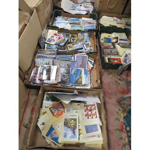 96 - SEVEN BOXES OF POSTCARDS AND FIRST DAY COVERS